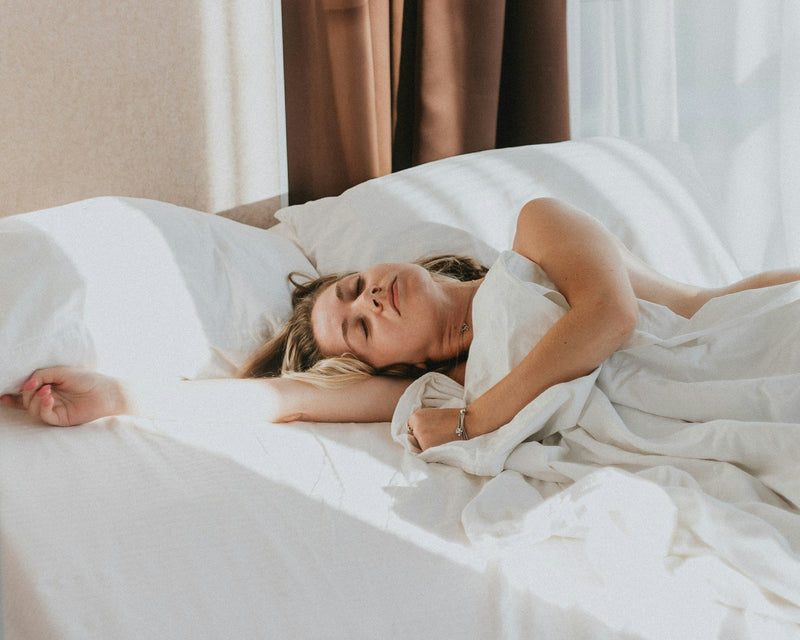 woman sleep well taking RestEase natural sleep aid supplement