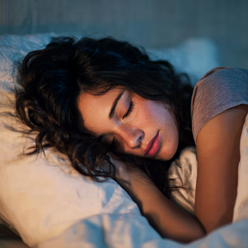 woman having sound and restorative sleep 