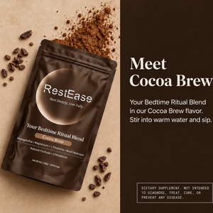 RestEase Cocoa Brew powder supplement bag lies on a beige surface with cocoa powder and chocolate pieces scattered around it. The right side of the image has a dark brown panel with the text 'Meet Cocoa Brew' and descriptive copy.